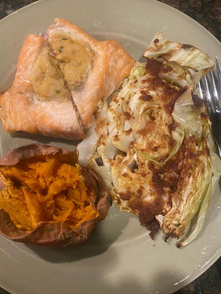 Salmon-with-seafood-stuffing-plain-sweet-potato-and-cabbage-steaks-with-parmesean-and-olive-oil
